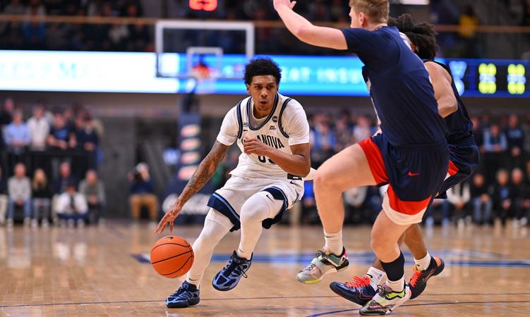 Lewis e Lindsay homenageados pelo BIG EAST
 - Printis